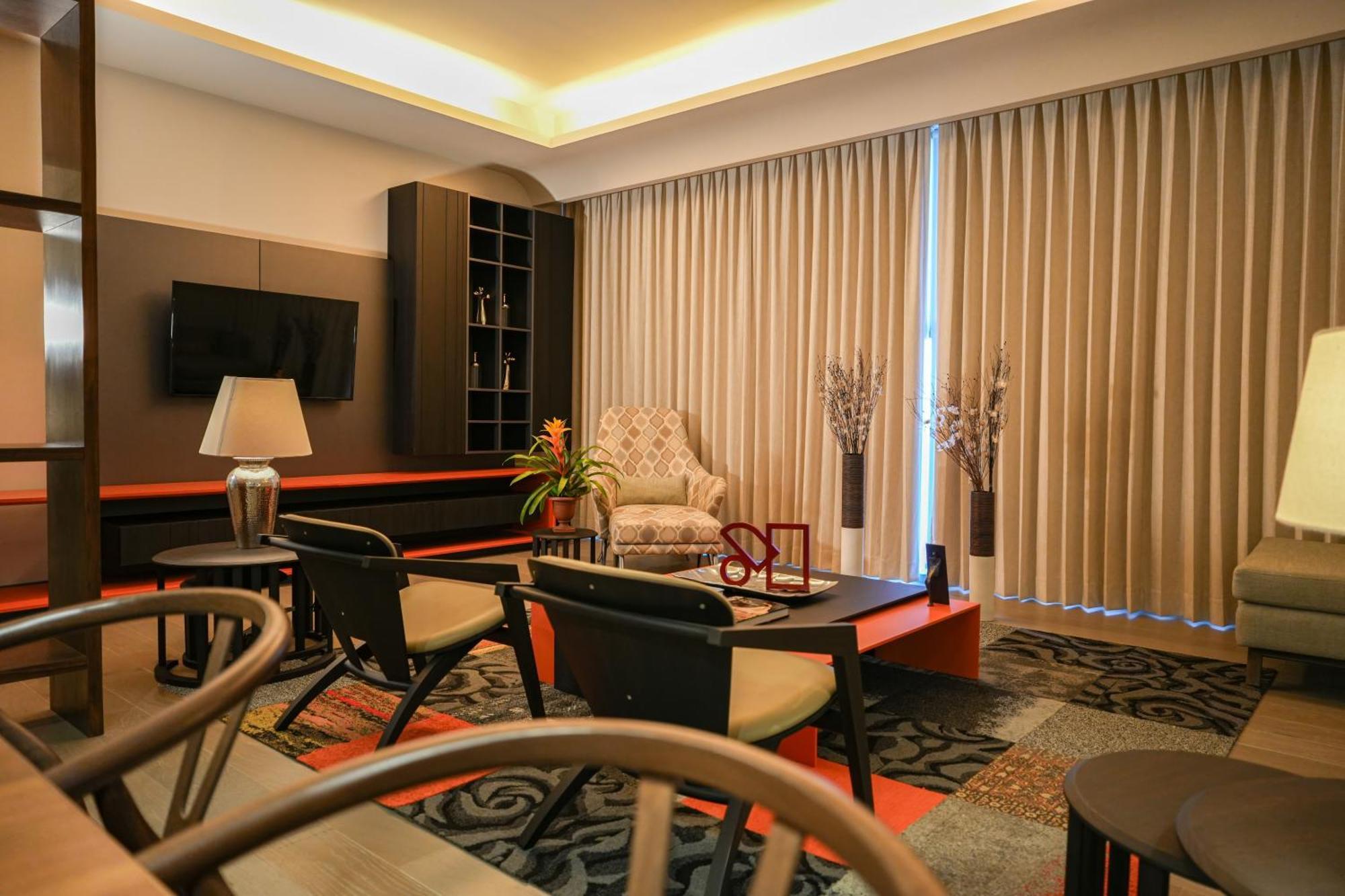 Metria Hotel León Buitenkant foto A living room in a condominium